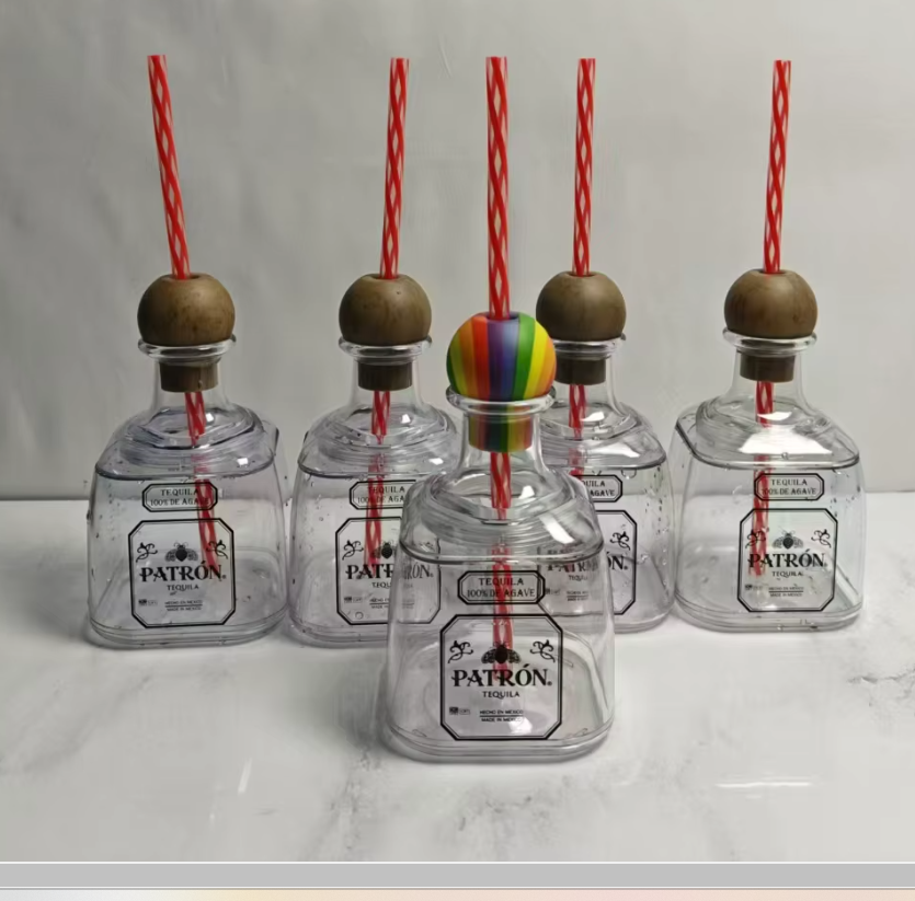 Blank plastic Patron-style cup with removable top and straw, ready for vinyl or sublimation customization — ideal for parties and gifts.