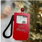 Red gas tank money holder ornament engraved with GAS Money text, holding a twenty dollar bill