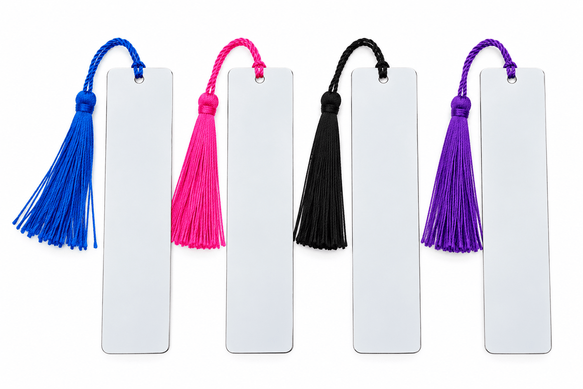 Illustrative studio image of four blank metal bookmarks with colorful tassels