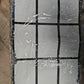 Black fringed nine-panel sublimation photo rug blank with nine white rectangular printing areas, shown in packaging
