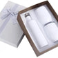 White sublimation wine gift set with bottle and two stemless glasses in a ribbon-tied box