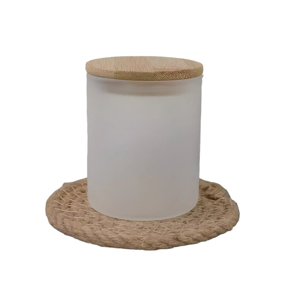 Frosted white sublimation candle jar with bamboo lid on a woven jute coaster