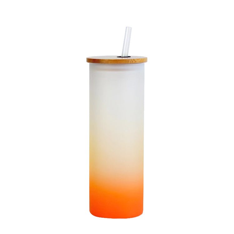 Frosted sublimation glass tumbler with orange gradient, bamboo lid, and straw