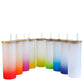 Nine frosted glass gradient tumblers in red, orange, pink, yellow, green, and blue with bamboo lids and straws