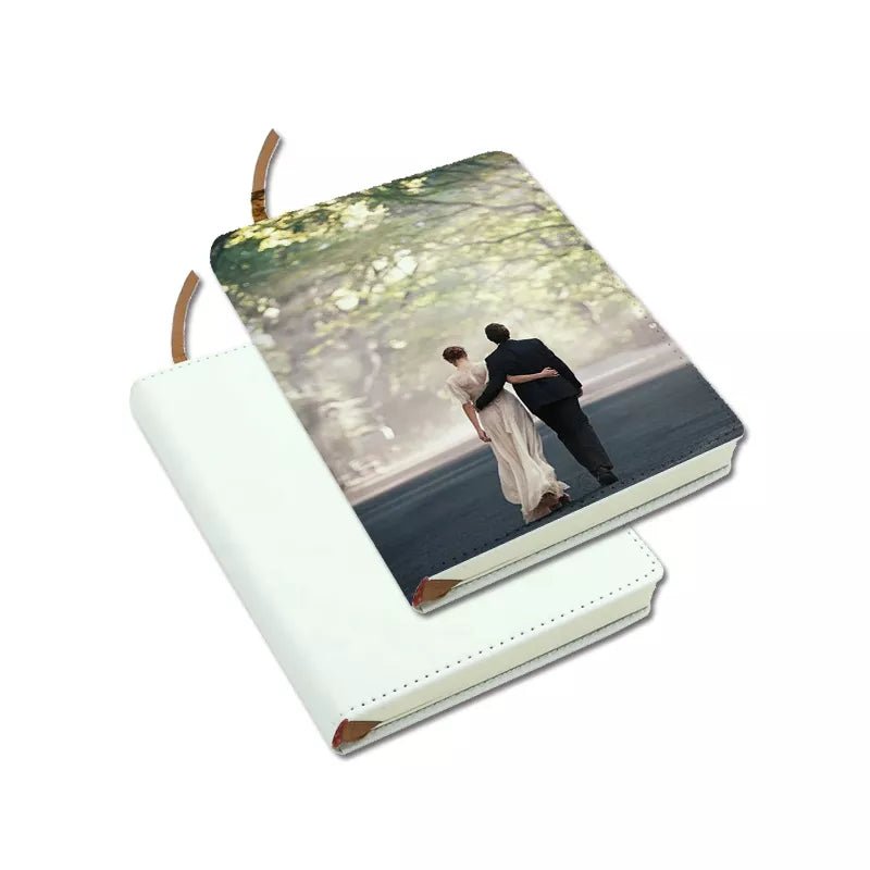 Two A4 sublimation journals, one blank white and one printed with a wedding couple photo