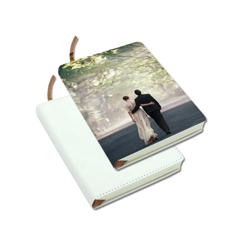 Two A5 sublimation journals, one blank white and one printed with a wedding couple photo
