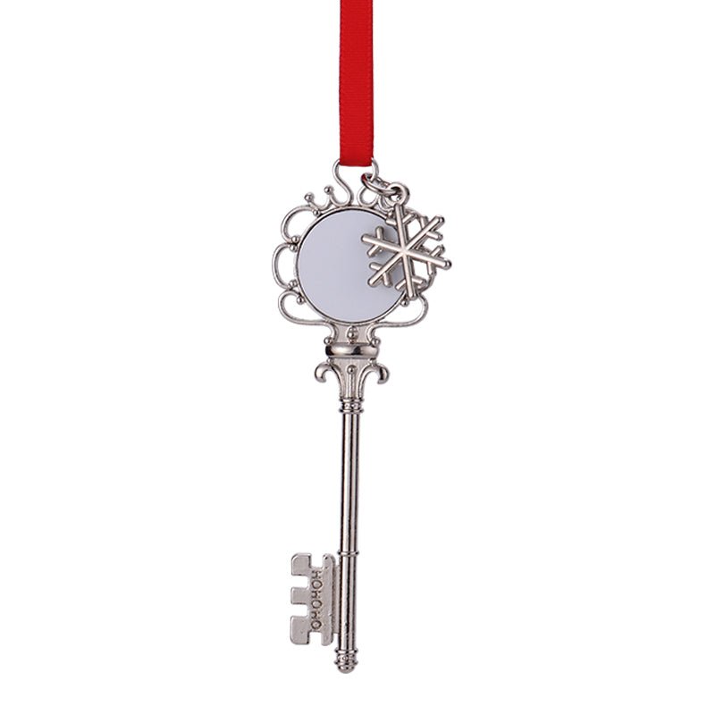 Ornate silver Christmas key ornament with blank photo center, snowflake charm, and red ribbon