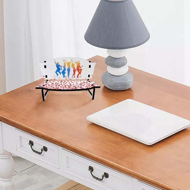 Sublimation memorial photo bench printed with dancer silhouettes, shown on a desk