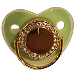 Sublimation pacifiers with green shield and gold decorative center