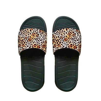 Pair of sublimation slide slippers with leopard print straps and black soles