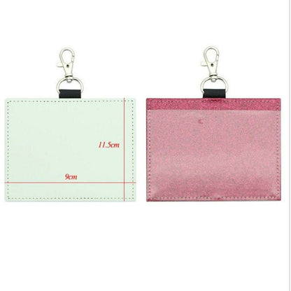 Two sublimation card holders with keychain clips in white and pink glitter, 9 by 11.5 centimeters